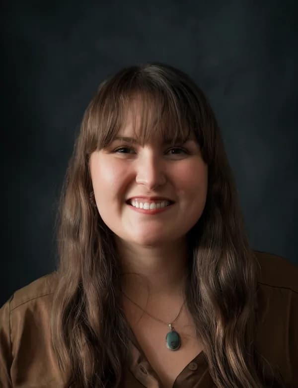 Professional headshot of Devyn Eadie, Registered Psychotherapist (ON)