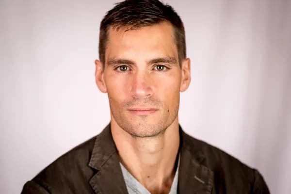 Professional headshot of Cameron Whatram, Registered Clinical Counsellor (BC)